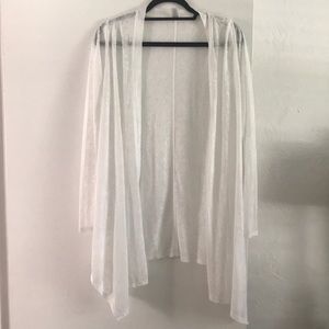 Tee Shoo. Very cute light weight cardigan. White burn-out fabric.